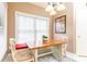Sunny breakfast nook featuring built-in bench seating, bright windows, and stylish light fixture at 211 Colonial Homes Nw Dr # 2508, Atlanta, GA 30309