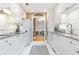 Galley kitchen featuring white cabinetry, granite countertops, and stainless steel appliances at 211 Colonial Homes Nw Dr # 2508, Atlanta, GA 30309