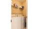 Efficient laundry area features side-by-side washer and dryer units with storage at 211 Colonial Homes Nw Dr # 2508, Atlanta, GA 30309