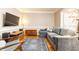 Comfortable living room with modern furnishings and hardwood floors at 211 Colonial Homes Nw Dr # 2508, Atlanta, GA 30309