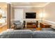 Comfortable living room with TV and view into another room at 211 Colonial Homes Nw Dr # 2508, Atlanta, GA 30309