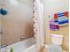 Well-lit bathroom with shower and bath at 4240 Hastings Dr, Cumming, GA 30041