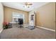 Neutral bedroom with built-in cabinets and large window at 4240 Hastings Dr, Cumming, GA 30041