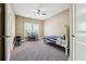 Bright bedroom with desk, chair and bed at 4240 Hastings Dr, Cumming, GA 30041