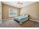 Well-lit bedroom with natural light and neutral decor at 4240 Hastings Dr, Cumming, GA 30041