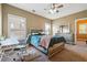 Bright bedroom with desk, chair, carpet and bed at 4240 Hastings Dr, Cumming, GA 30041