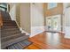 Spacious foyer with high ceilings and stairs at 4240 Hastings Dr, Cumming, GA 30041