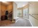 Large walk-in closet with built-in shelving and a window seat at 4240 Hastings Dr, Cumming, GA 30041