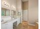 Bathroom with double sinks and vanity at 378 Rhodes House Dr, Suwanee, GA 30024
