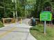 The Ivy Creek Greenway is surrounded by trees and lush greenery with a handicap-accessible ramp at 378 Rhodes House Dr, Suwanee, GA 30024