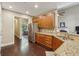 Traditional kitchen boasts granite countertops and stainless steel appliances at 378 Rhodes House Dr, Suwanee, GA 30024