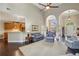 Open-concept living area featuring a kitchen and dining area at 378 Rhodes House Dr, Suwanee, GA 30024