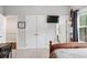 Bedroom featuring white walls, carpet flooring, and access to the closet at 3786 Alstead Manor Way, Suwanee, GA 30024
