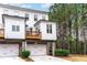 Charming townhome with a private balcony, brick foundation, and attached garage at 3786 Alstead Manor Way, Suwanee, GA 30024