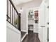 Hallway featuring convenient built-in desk area, with shelves and drawers, perfect for organization at 3786 Alstead Manor Way, Suwanee, GA 30024