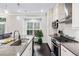 Gourmet kitchen featuring a center island, stainless steel appliances, and plenty of storage at 3786 Alstead Manor Way, Suwanee, GA 30024