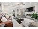 Spacious living room with fireplace, connecting to office space, ideal for modern living and entertaining at 3786 Alstead Manor Way, Suwanee, GA 30024