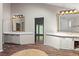 Large dual sink vanity in the bathroom, featuring a walk-in shower at 3863 Dundee Ne Dr, Roswell, GA 30075