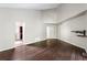 Spacious bedroom with wood floors, a large closet and vaulted ceilings at 3863 Dundee Ne Dr, Roswell, GA 30075