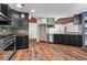 Well-designed kitchen with stone accents and stainless steel appliances at 3863 Dundee Ne Dr, Roswell, GA 30075