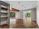 Bright living room featuring wood floors and a view of the outdoor scenery at 3863 Dundee Ne Dr, Roswell, GA 30075