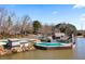 Community pool next to the lake with lakeside building at 3863 Dundee Ne Dr, Roswell, GA 30075
