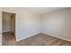 This bedroom has neutral walls and carpet with a window letting in lots of light at 5280 Tussahaw Xing, Mcdonough, GA 30252