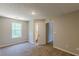 Bedroom featuring a window and view of the en-suite bathroom at 5280 Tussahaw Xing, Mcdonough, GA 30252