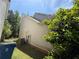 Home exterior featuring vinyl siding, landscaping and an air conditioning unit at 5280 Tussahaw Xing, Mcdonough, GA 30252