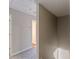View of the upstairs hallway featuring neutral paint and carpeting at 5280 Tussahaw Xing, Mcdonough, GA 30252