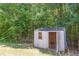 This outdoor shed provides useful storage for any gardener at 5280 Tussahaw Xing, Mcdonough, GA 30252