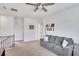 Upstairs loft with neutral carpet and a gray sofa provides a relaxing area for Gathering time at 5751 Green Arbor Way, Sugar Hill, GA 30518
