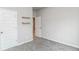 Bedroom features carpeted floors, white walls and doors, and wood shelves at 1024 Burke St # 56, Lawrenceville, GA 30046