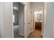 Hallway showcasing access to a bedroom and a bathroom with a vanity at 1024 Burke St # 56, Lawrenceville, GA 30046