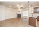 Well-lit living room featuring hardwood floors, a fireplace, and a ceiling fan at 1024 Burke St # 56, Lawrenceville, GA 30046