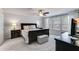 Main bedroom features neutral decor, plush carpet, and windows at 174 Riverwood Dr, Dallas, GA 30157