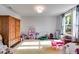 Versatile bonus room with natural light, perfect for a playroom or home office at 174 Riverwood Dr, Dallas, GA 30157