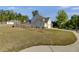 Beautiful home with a well-maintained lawn and a two-car garage at 174 Riverwood Dr, Dallas, GA 30157