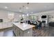 Open kitchen flows into the living and dining areas creating a comfortable living space at 174 Riverwood Dr, Dallas, GA 30157