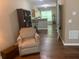 Open-concept living area with hardwood floors flowing into the kitchen space at 2253 Dillard Xing, Tucker, GA 30084