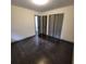 Cozy bedroom with hardwood floors, neutral walls, and ample closet space at 2704 Terratim Ln, Decatur, GA 30034
