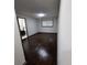 Bedroom with hardwood floors, neutral walls, and lots of natural light at 2704 Terratim Ln, Decatur, GA 30034