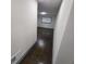 Hallway with dark wood floors and natural light at 2704 Terratim Ln, Decatur, GA 30034
