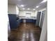 Spacious kitchen with stainless appliances, granite countertops, and dark hardwood floors at 2704 Terratim Ln, Decatur, GA 30034