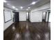Spacious open floor plan with hardwood floors and recessed lighting at 2704 Terratim Ln, Decatur, GA 30034