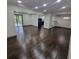 Spacious open floor plan with hardwood floors and recessed lighting at 2704 Terratim Ln, Decatur, GA 30034