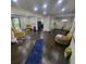 Spacious living room with dark wood floors and large windows at 2704 Terratim Ln, Decatur, GA 30034