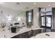 Bright, open lobby with modern furniture, tall windows, and a marble tiled floor at 3040 Peachtree Nw Rd # 713, Atlanta, GA 30305