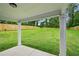 Large, grassy backyard with a wooden fence, perfect for outdoor activities and relaxation at 1347 Midlawn Dr, Decatur, GA 30032