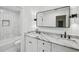 Modern bathroom features a marble vanity, vessel sinks, and a tiled shower/tub combination at 1347 Midlawn Dr, Decatur, GA 30032